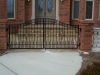 Custom Iron Double Pedestrian Arched Patio Gate with Scrolls and Finials